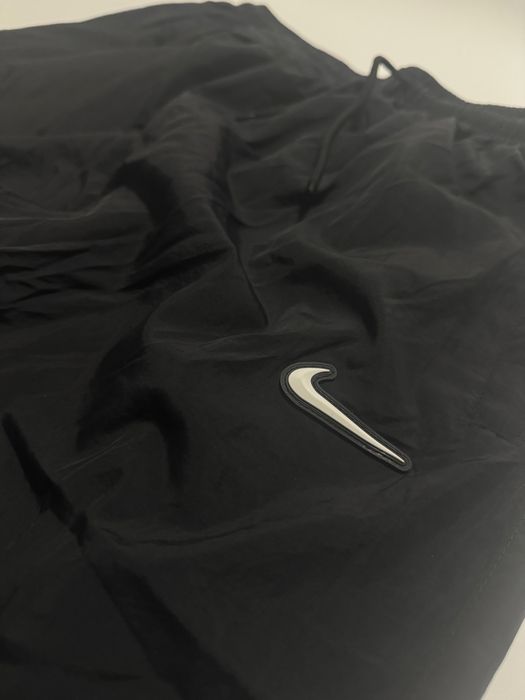 Нейлонові штани Nike L розміру