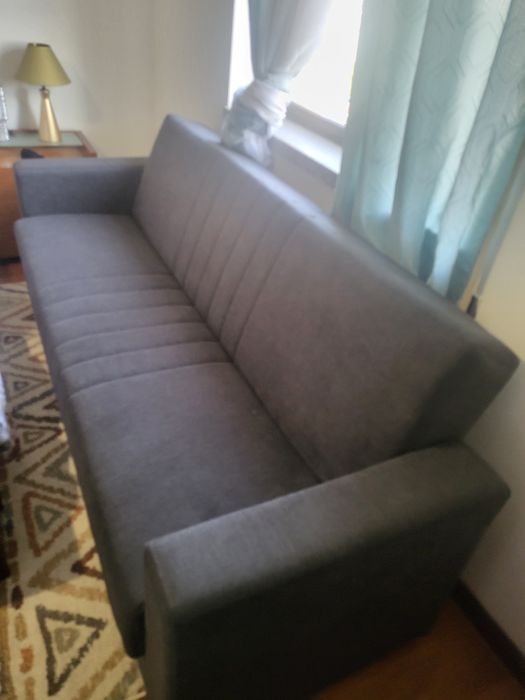 Sofá Cama praticamente nova.