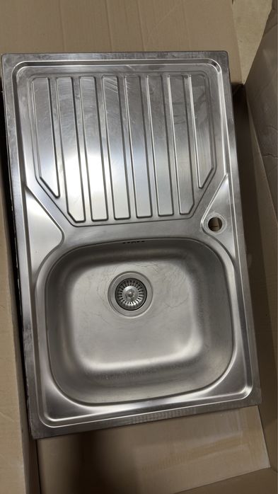 Material de casa de banho torneiras entre outras coisas