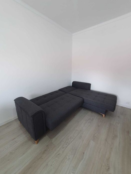 Sofá-cama com arumação