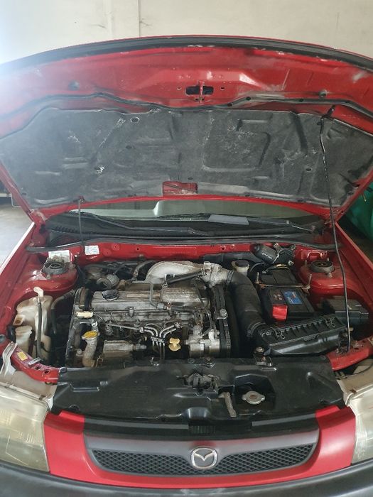 Mazda 323  2.0cc