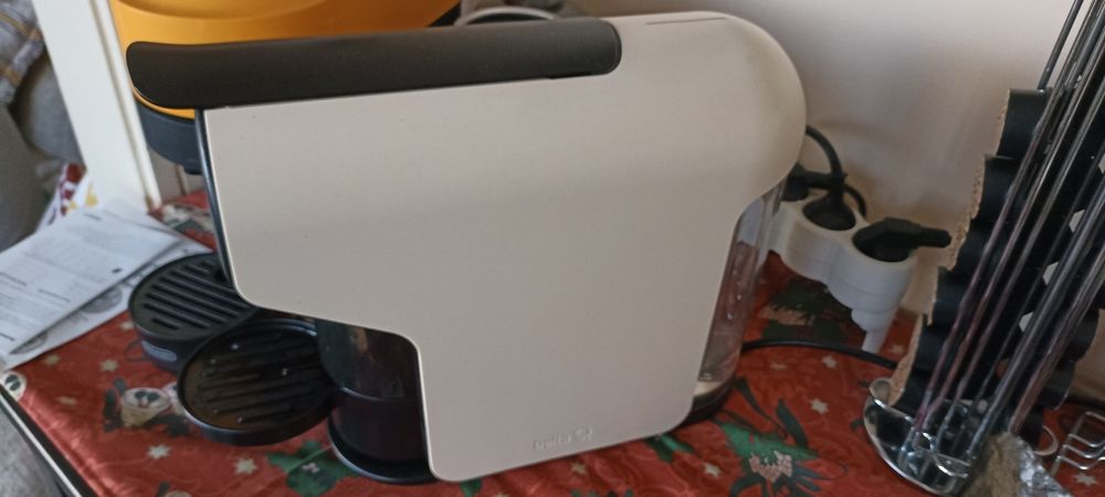 Máquina de café delta q