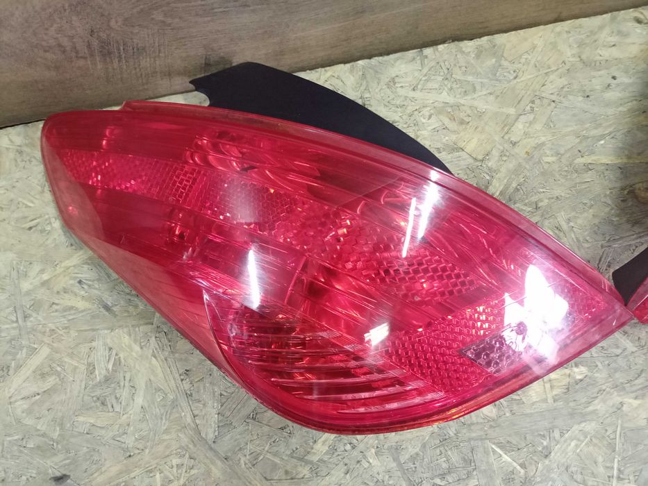 Peugeot 308 T7 hatchback lampa tył tylna prawa lewa oryginał wkład