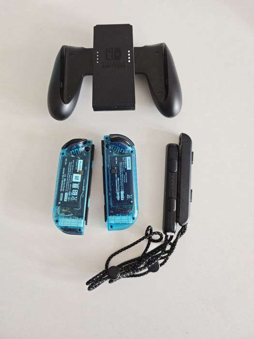 Joycon Blue Transparent + Grip + Strapy