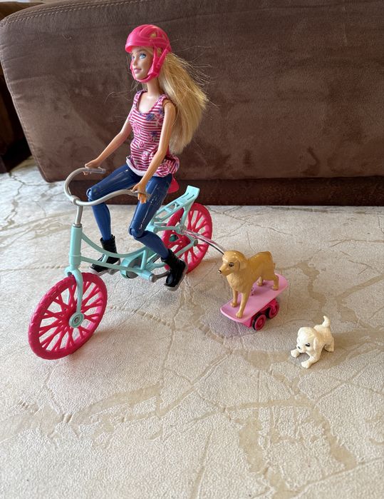 Lalka Barbie na rowerze z pieskami, Mattel