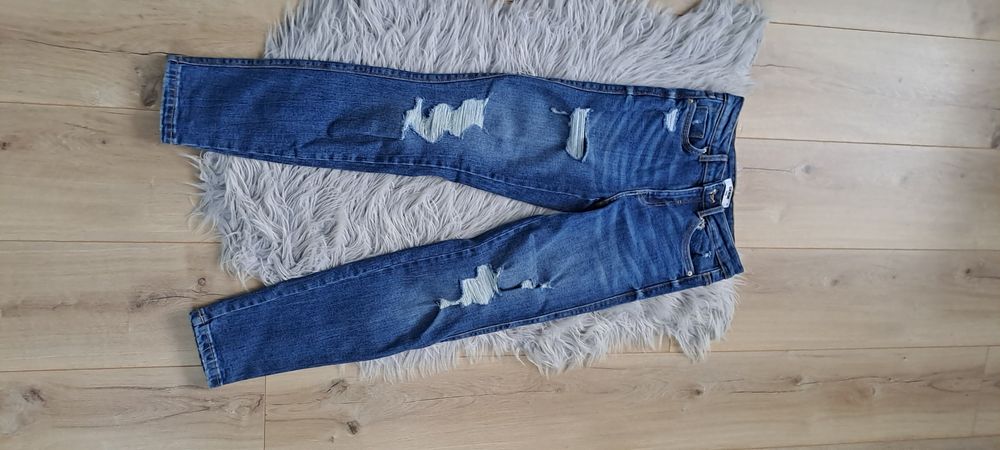 Jeansy z dziurami rozmiar 34