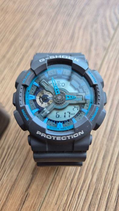 Casio G-SHOCK GA-110TS-8A2 – szary/niebieski, 200 m, moduł 5146 / Nowa bateria / Super stan