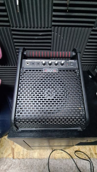 Bateria electrónica Carlsbro CSD-500 + amplificador Aroma ADX-20