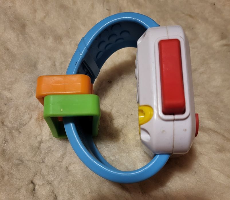 Zegarek i piesek do ciągnięcia fisher price.