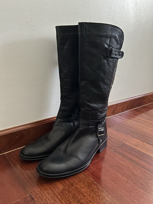 Botas cano alto de pele