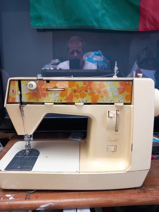 Maquina portátil singer