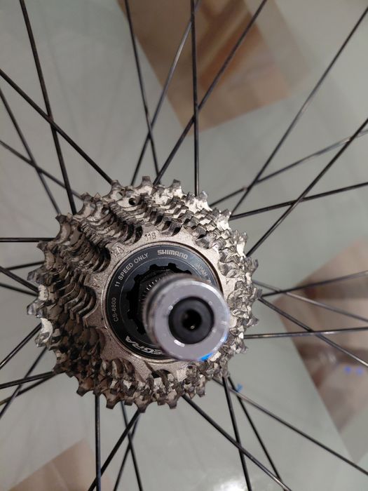 Roda (cassete 11 velocidades) e pneu treino rolo indoor