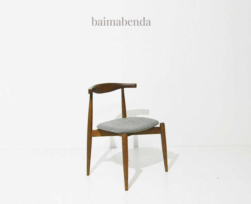 Cadeira estilo nórdico inspirada no design de Hans Wegner