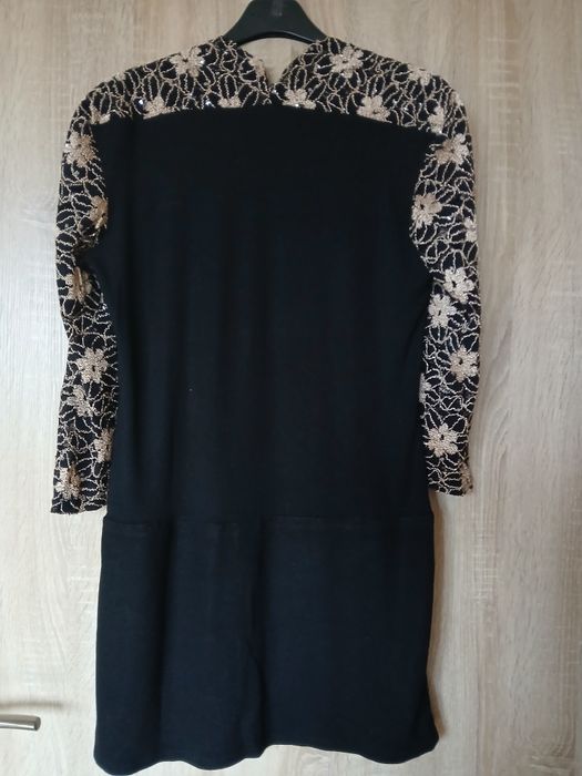 Czarna sukienka wizytowa  rozmiaru M/L .
