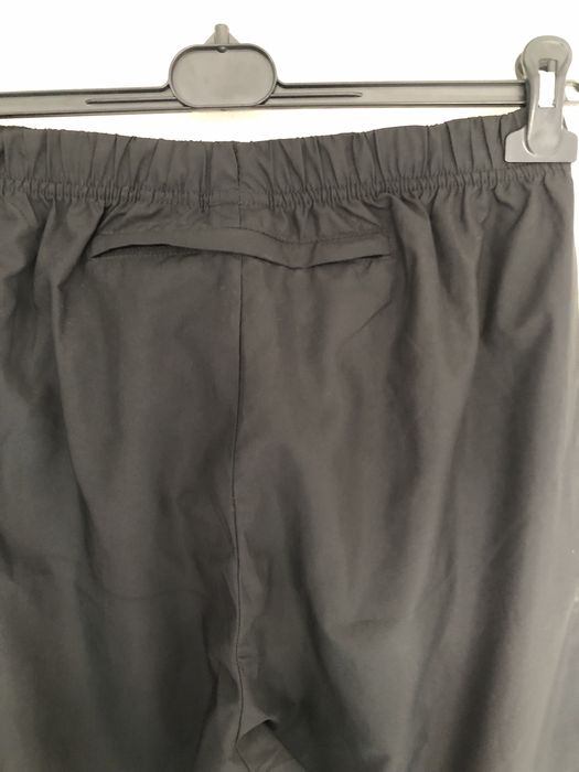 Czarne ortalionowe spodnie dres nike uniwersalne w bdb stanie