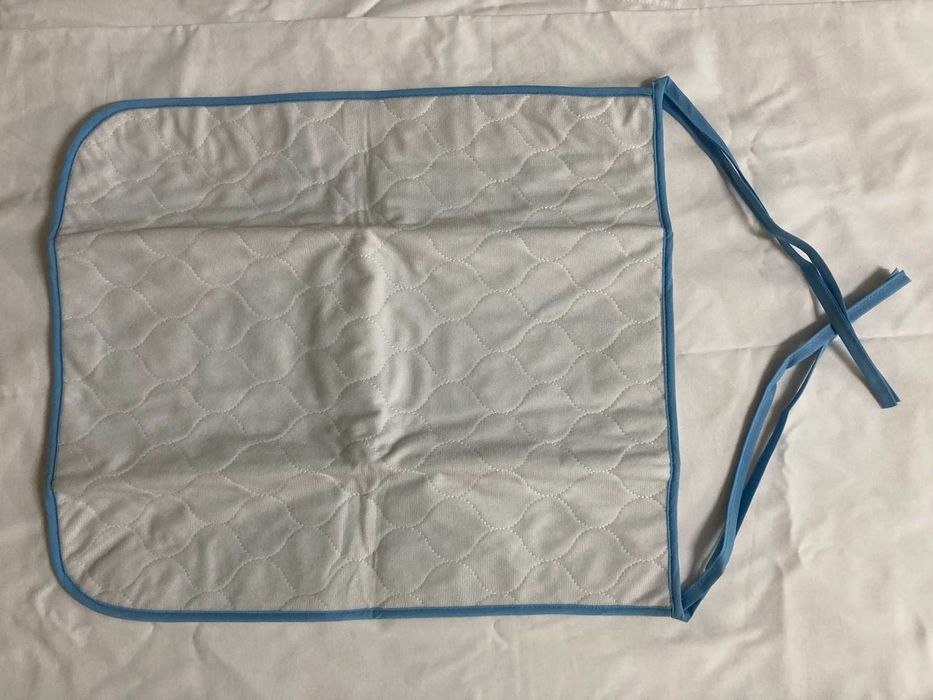 Resguardo lavável e reutilizável para cadeira de rodas