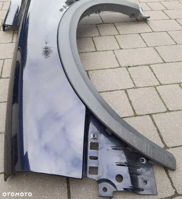 Volvo XC90 XC 90 błotnik lewy przód przedni z listwą granatowy