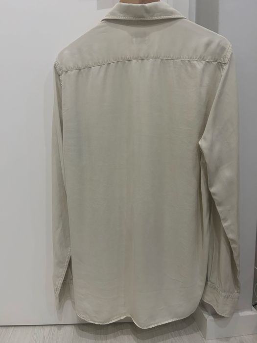 Camisa Scalpers como nova