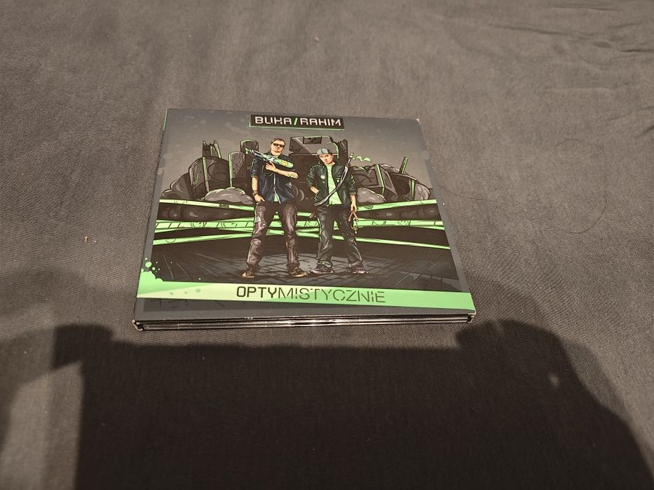 Buka Rahim Optymistycznie z autografami