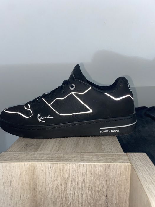 Tênis Carl Kani em bom estado