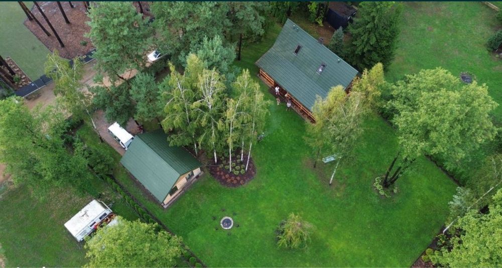 Dom z pieknym ogrodem w lesie nad Narwią na wynajem
