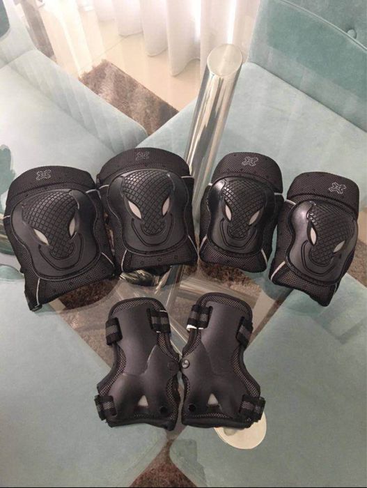 Patins em ótimo estado com proteções