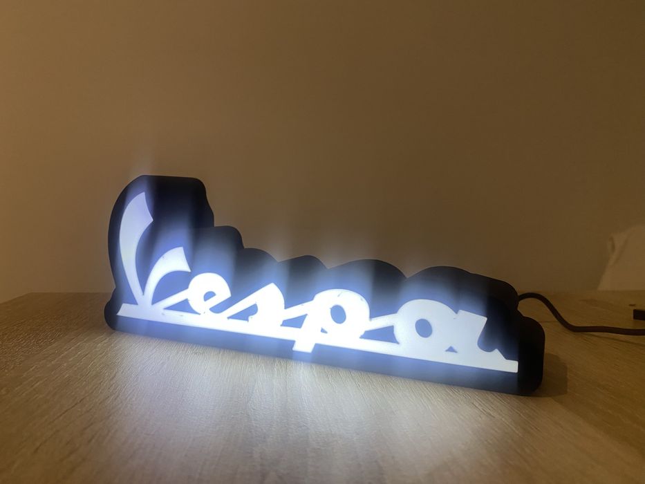 Logotipo luminoso Vespa