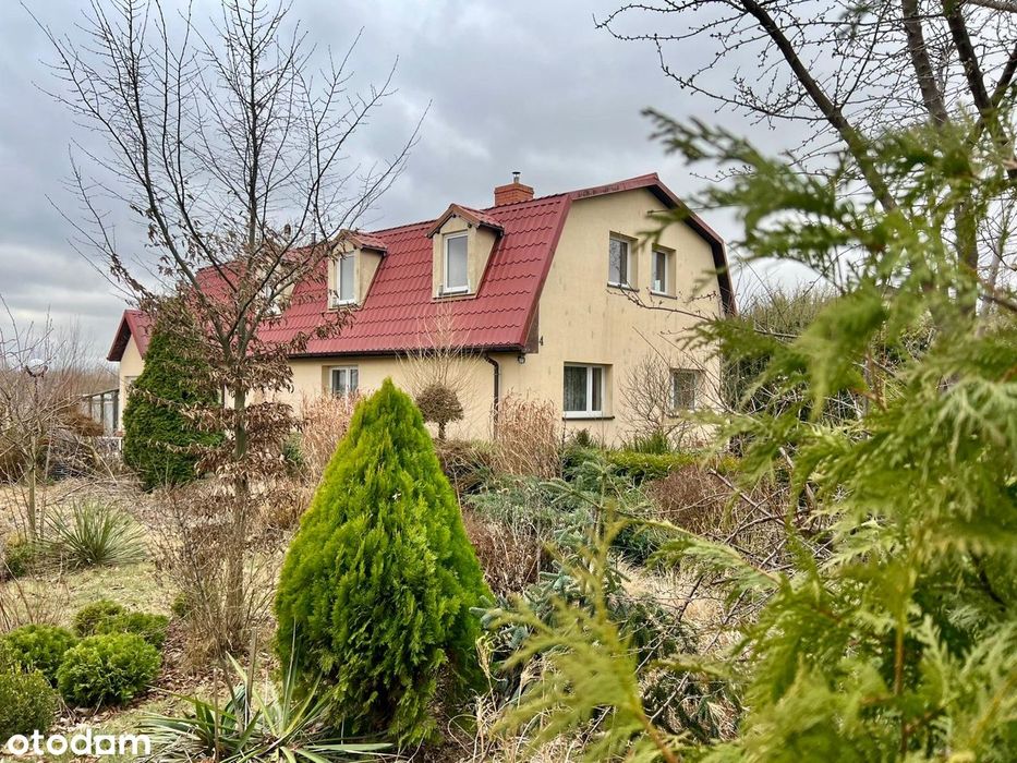 Dom z nagradzanym ogrodem/ duży taras/ garaż