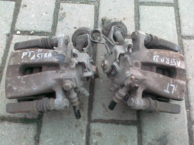 OPEL ASTRA II G ZACISK LEWY PRAWY TYŁ TYLNI LUCAS