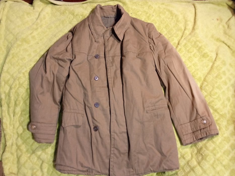 Тёплые вещи СССР шубы телогрейки валенки