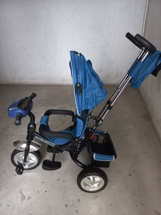 Трёхколёсный велосипед-коляска с родительской ручкой Tilly Storm.