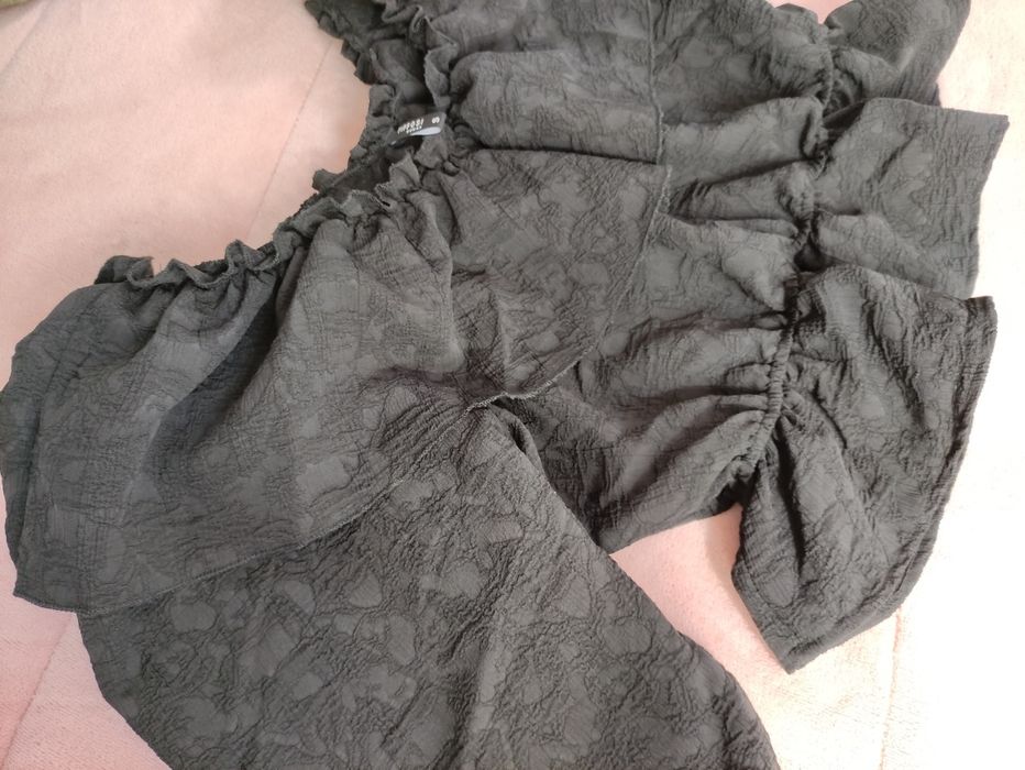 Blusa com folhos Nova
