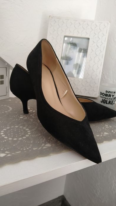 Чоботи і туфлі-лодочки