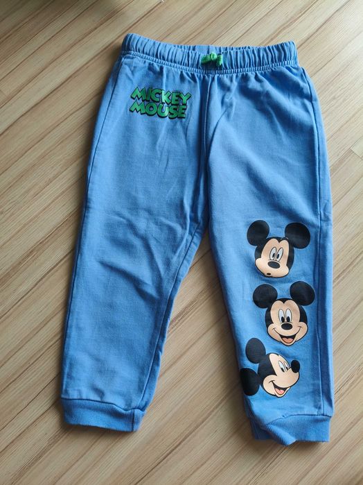 Disney Baby, niebieskie spodnie dresowe, r. 98