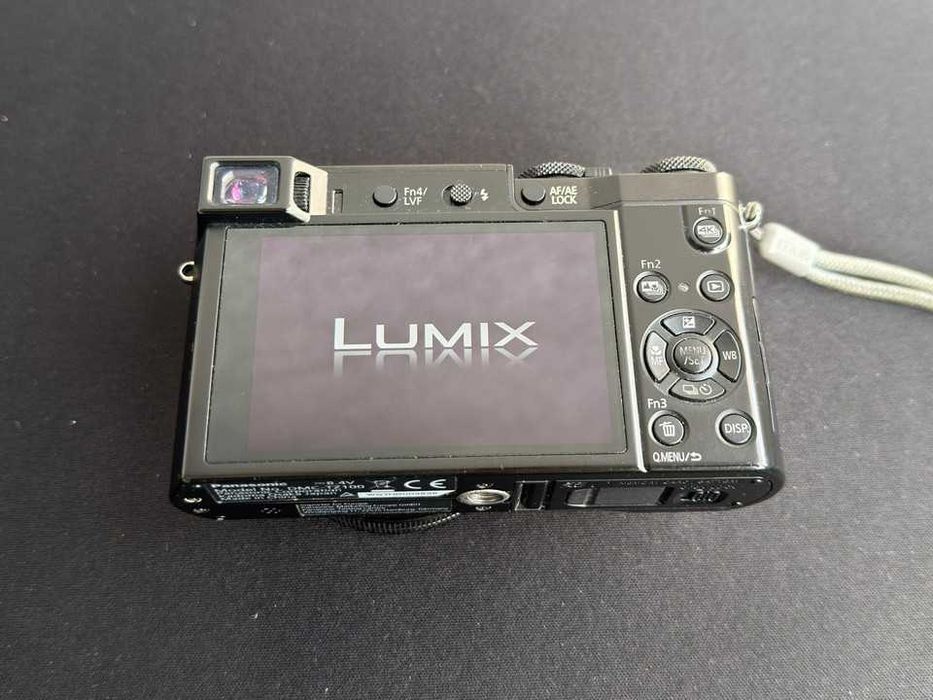 Aparat Kompaktowy Panasonic DMC-TZ100 Lumix + oryginalna ładowarka + etui + karta sd 64gb