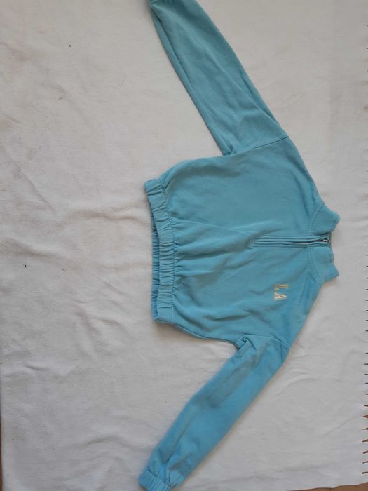 Turkusowa bluza krótka bomberka H&M r.134-140