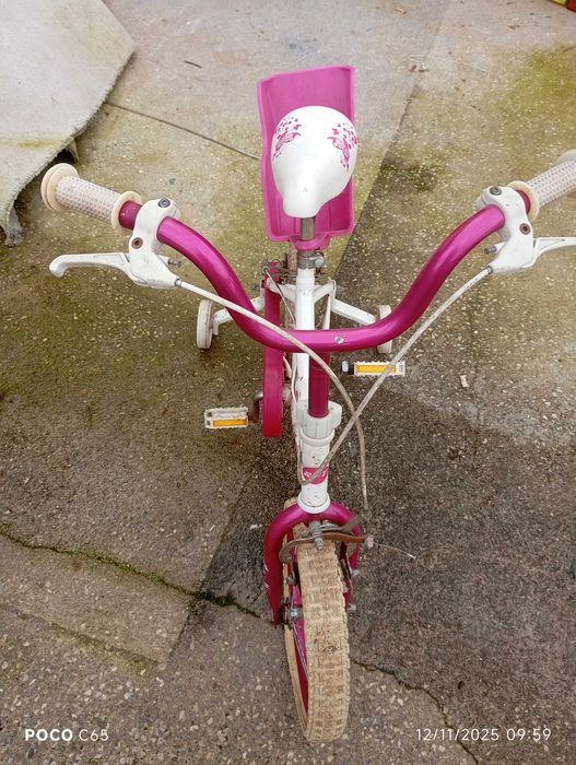 bicicleta menina rodinhas laterais indicada para iniciaçao