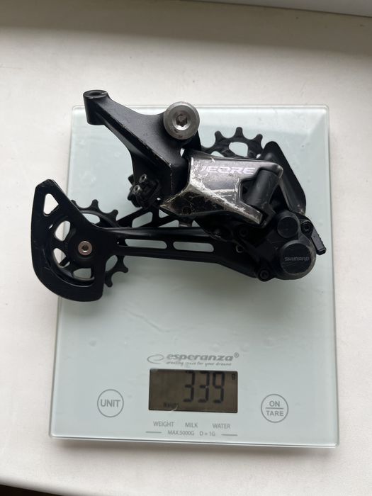 Задній перемикач і манетка Shimano Deore SL-M6100, 12 швидкостей