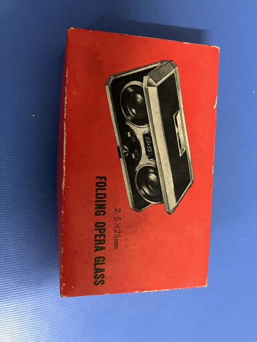 Binoculos opera dobraveis