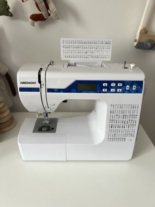 Комп’ютеризована компʼютерна швейна машина