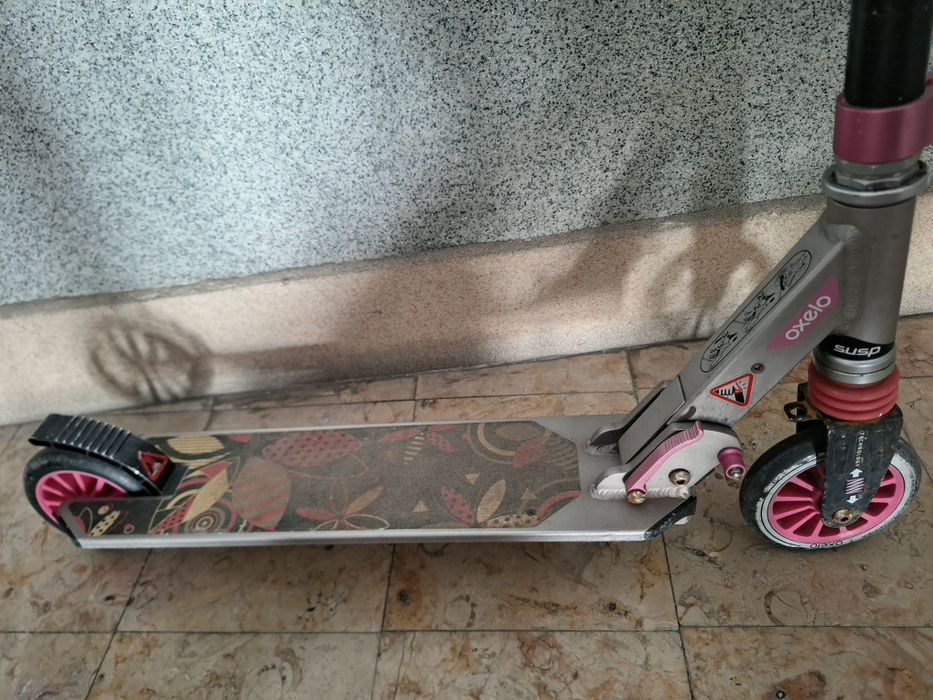 Trotinete menina