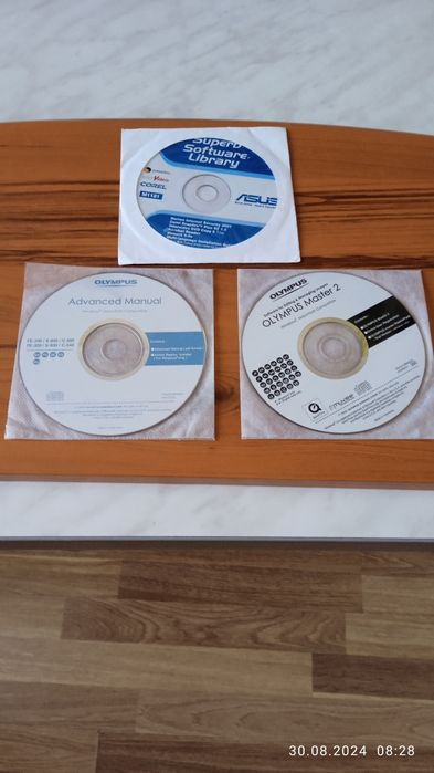 Диски- Asus , OLYMPUS .