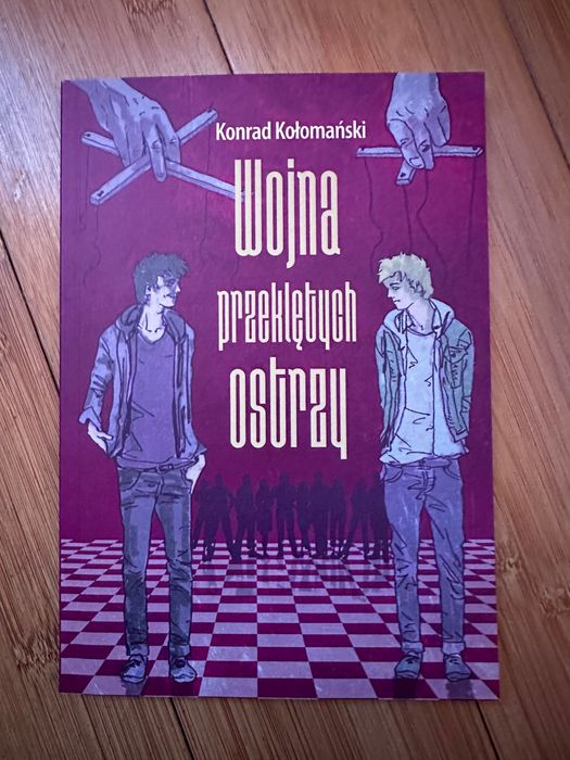 Wojna przeklętych ostrzy. Konrad Kołomański książka
