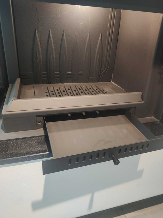 Kominek z boczną szybą kamiennym blatem montażem Kraków Katowice Gdów