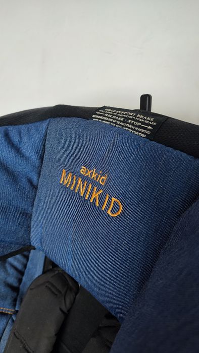 Fotelik Axkid Minikid | 9-25 kg | RWF | Bezwypadkowy bezpieczny, tyłem do kierunku