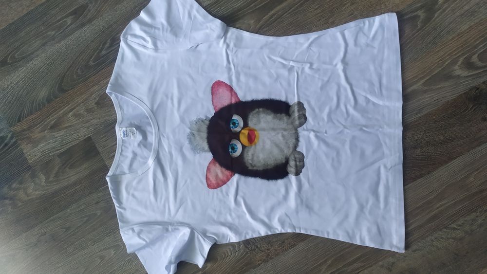 Футболка на дівчинку 7-8 років.