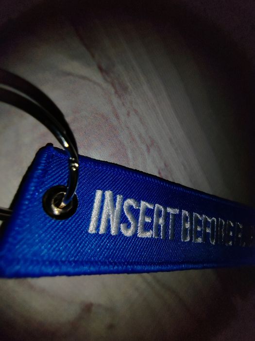 Niebieski haft Insert before flight