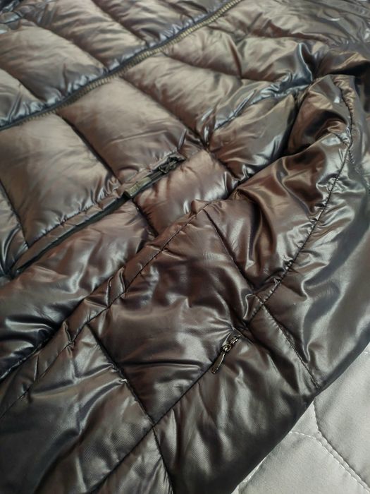 Жіноча глянцева пухова куртка