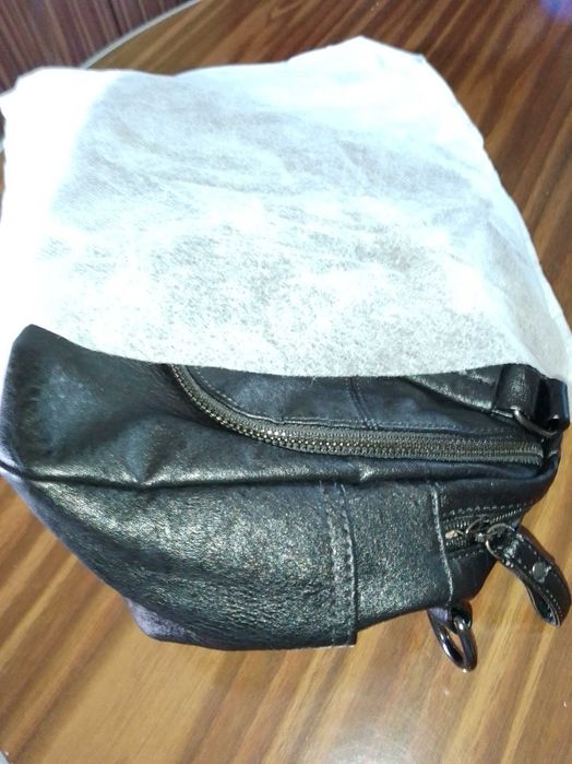 Carteira/ mochila de senhora nova