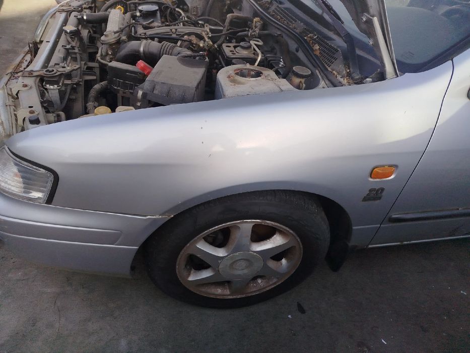 Guarda-lamas esquerdo NISSAN Primera Wagon (WP11)